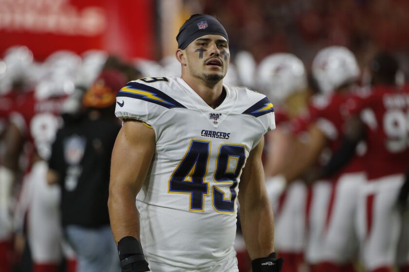 Los Angeles Chargers linebacker Drue Tranquill (49) during the first half of an NFL preseason football game against the Arizona Cardinals, Thursday, Aug. 8, 2019, in Glendale, Ariz. (AP Photo/Rick Scuteri)