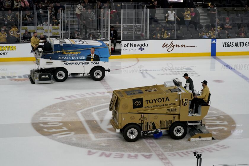 Ice resurfacers are used between periods during Game 2 of the NHL hockey Stanley Cup Finals between the Florida Panthers and the Vegas Golden Knights, Monday, June 5, 2023, in Las Vegas. Ice maintenance is generally the same across the league. Technicians work to make sure the ice — 1.25 to 1.5 inches thick — is the right temperature and consistency so that the puck slides smoothly and the players can slice along the ice with no problems. But with the Stanley Cup Final between the Las Vegas Golden Knights and Florida Panthers taking place in two of the hottest markets in the country in South Florida and Las Vegas, making sure outside conditions don't compromise the ice is an all-day process.(AP Photo/Abbie Parr)