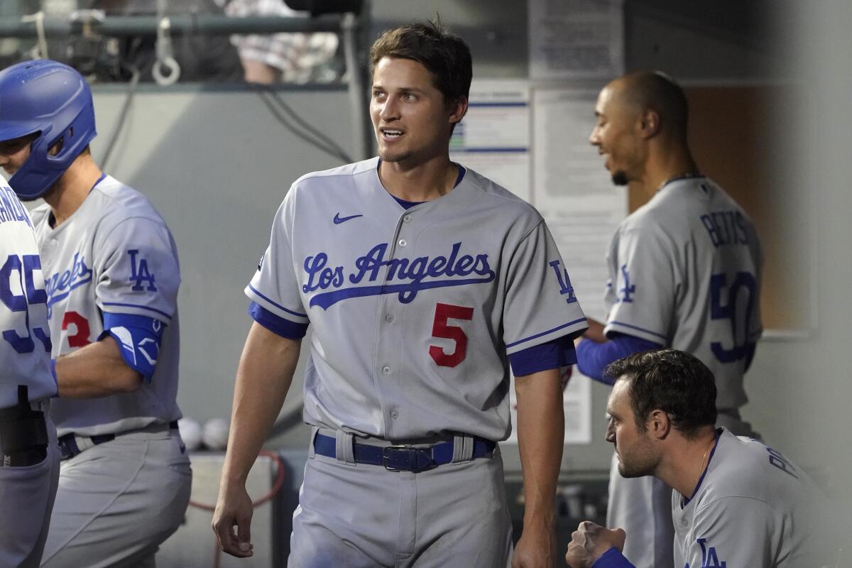 Los Angeles Dodgers Corey Seager (5) reacts in the dugout after he hit a two-run home run.