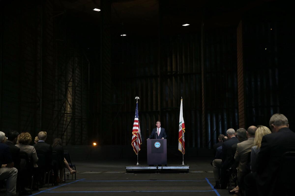 Secretary of Defense Ashton Carter speaks inside of the Unitary Plan Wind Tunnel, the world's largest, at the NASA Ames Research Center in Mountain View, Calif., on Friday.