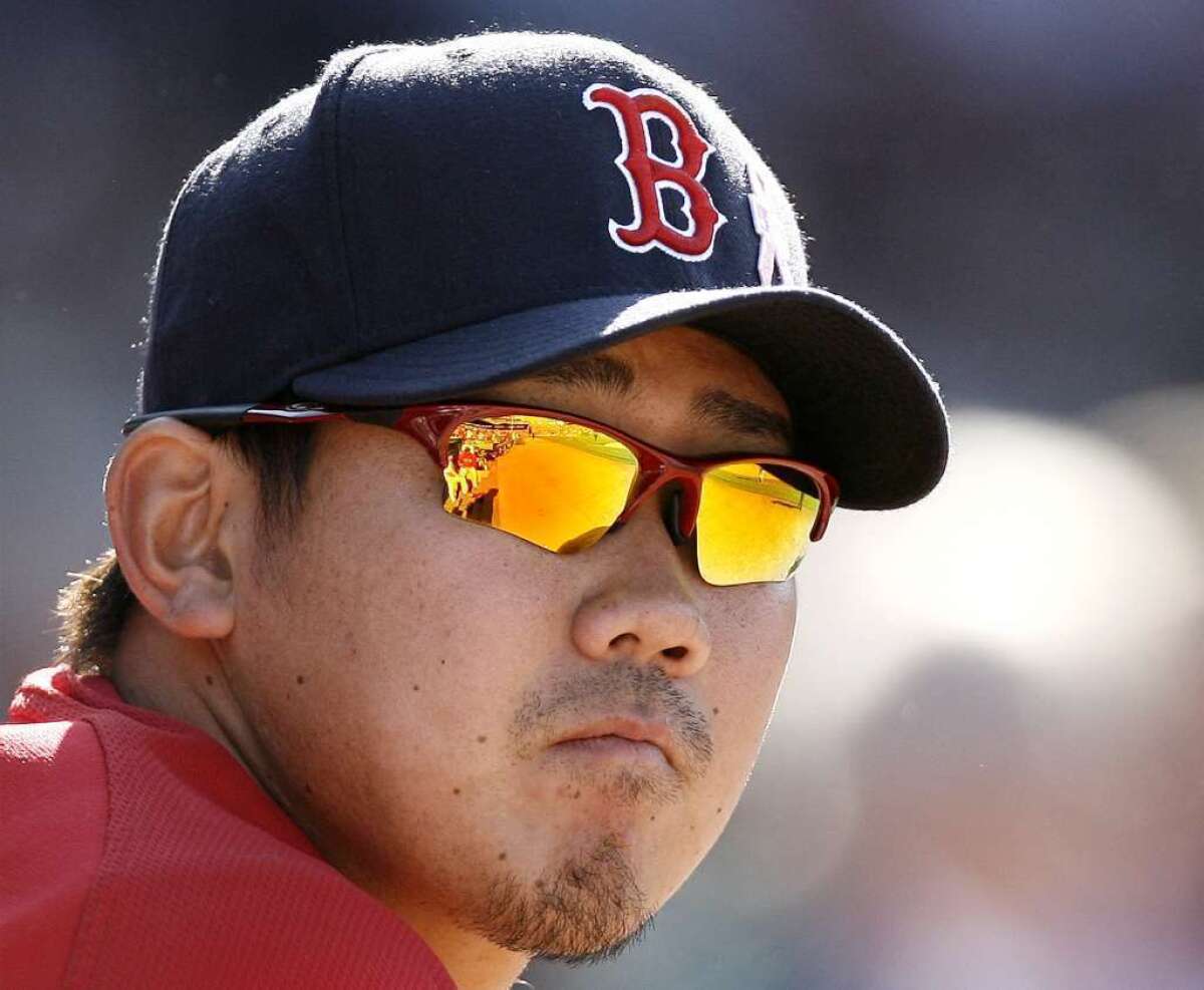 Boston Red Sox pitcher Daisuke Matsuzaka watches a game in 2007.