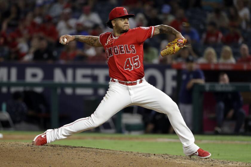 Los Angeles Angels relief pitcher Felix Pena throws to a Seattle Mariners batter during the sixth inning of a baseball game Friday, July 12, 2019, in Anaheim, Calif. (AP Photo/Marcio Jose Sanchez)