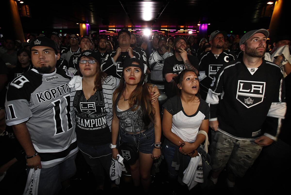 Kings fans watch Game 4 of the Stanley Cup Final on a big screen Wednesday at L.A. Live.