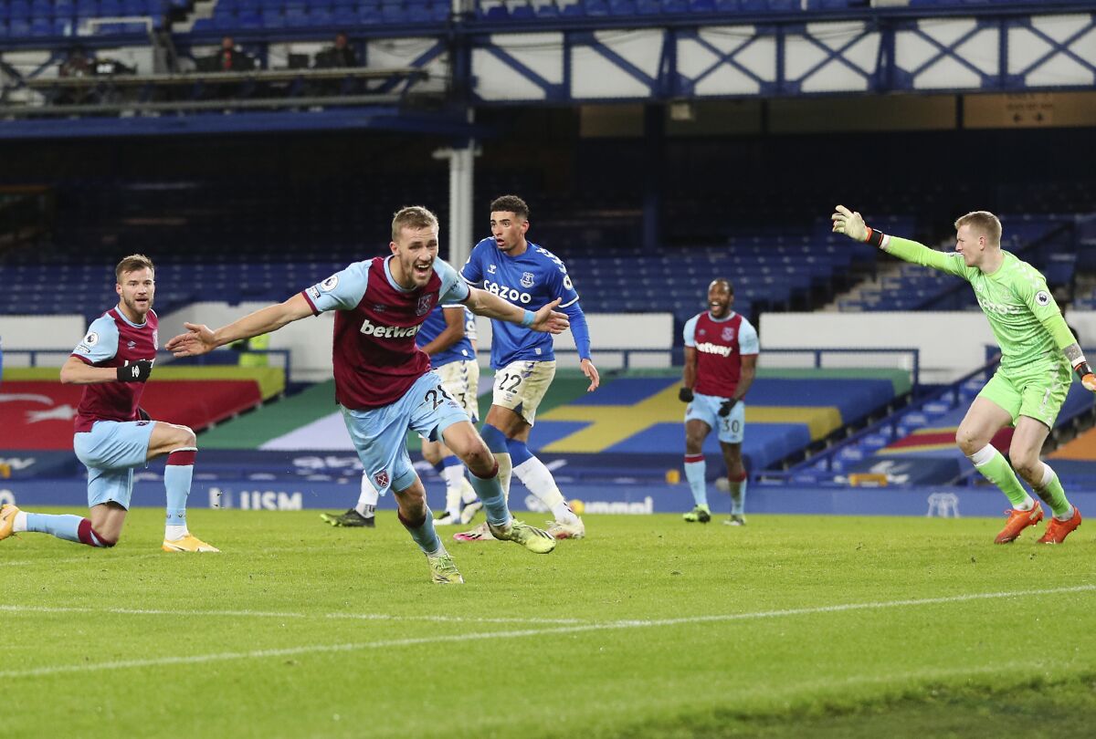 West Ham's Tomas Soucek celebrates after scoring his side's opening goal during the English Premier League soccer match between Everton and West Ham at Goodison Park in Liverpool, England, Friday, Jan. 1, 2021. (Peter Byrne,Pool via AP)