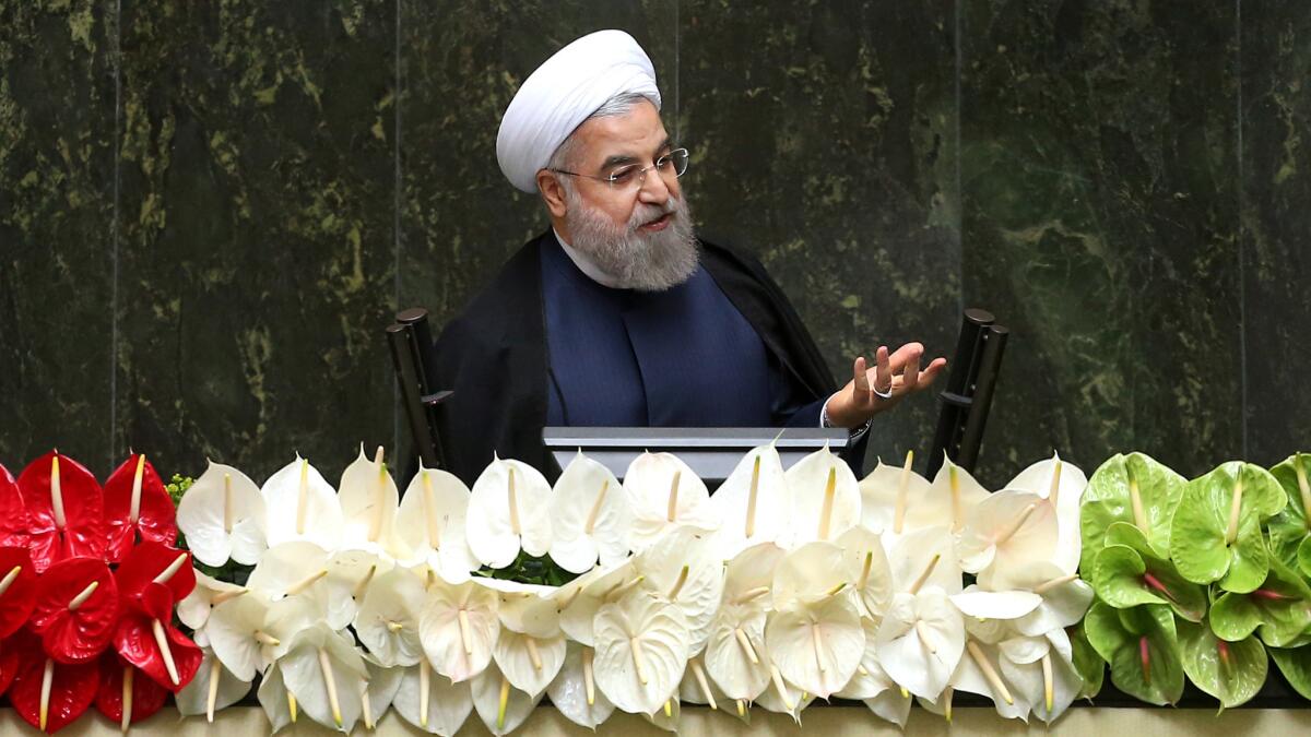 President Hassan Rouhani speaks at the inauguration of Iran's new parliament in May.