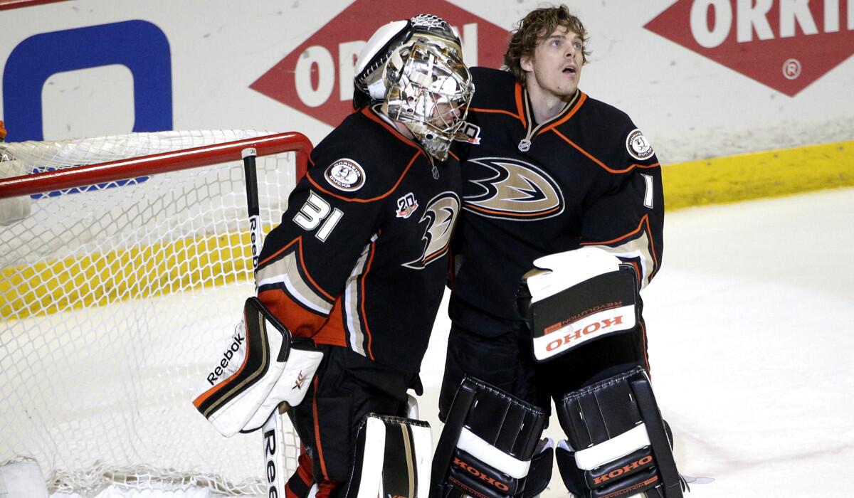 Ducks rookie goalie Frederik Andersen (31) is congratulated by veteran golie Jonas Hiller after a 3-2 victory over the Dallas Stars in Game 2 of their first-round playoff series.