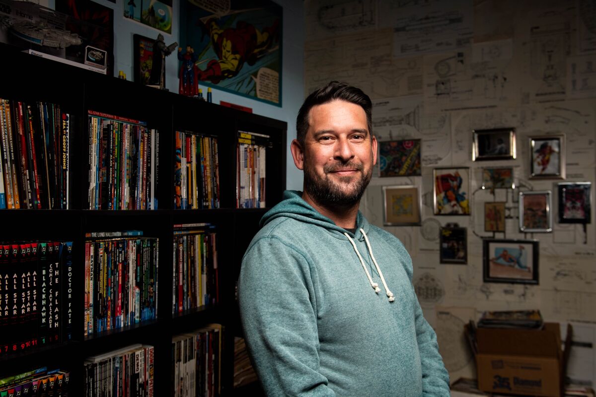 Alonso Nunez, executive director and co-founder of Little Fish Comic Book Studio, poses for a photo inside the space 