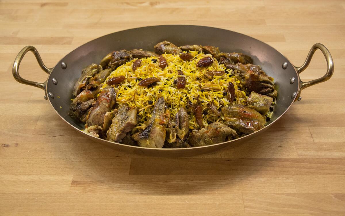Rice with toasted noodles (reshteh polow) served with lamb