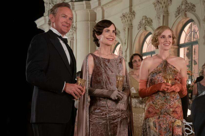 Hugh Bonneville, left, Elizabeth McGovern and Laura Carmichael in “Downton Abbey: A New Era”