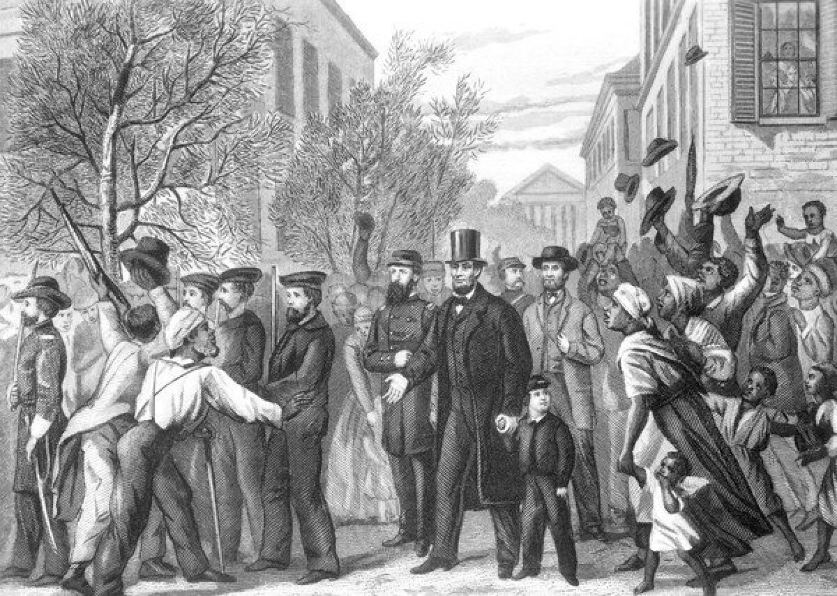 Abraham Lincoln in Richmond, Va., on April 3, 1865, shortly after it was captured by Union troops who freed the slaves that are crowding around the president. Engraving by J.C. Butt after a drawing by L. Hollis.