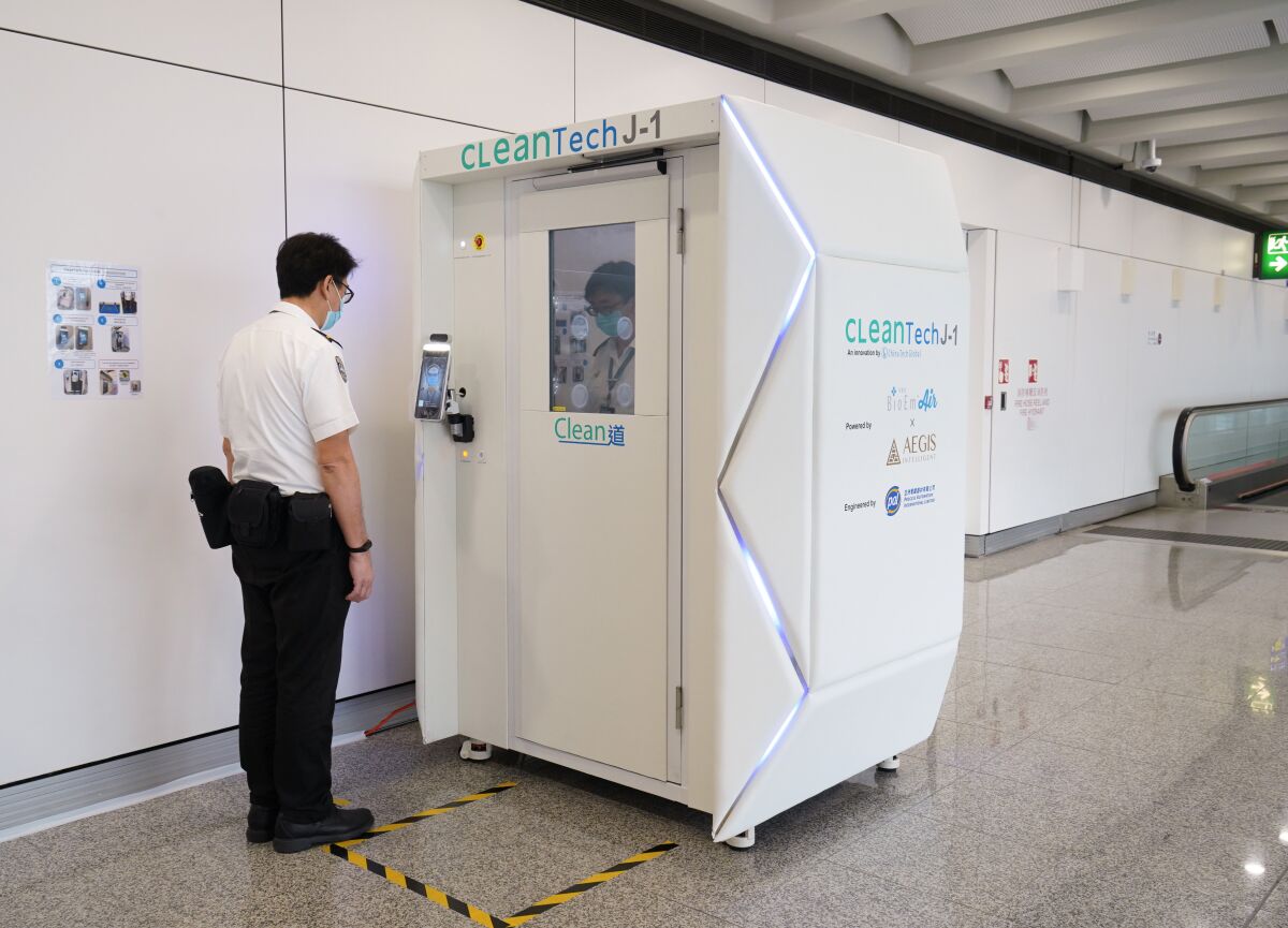 The Hong Kong International Airport is testing a device that is meant to disinfect employees before they start to work with passengers.