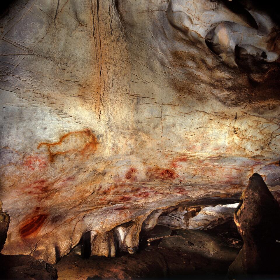 The Panel of Hands, El Castillo cave, Spain. A hand stencil has been dated to earlier than 37,300 years ago and a red disk to earlier than 40,600 years ago, making them the oldest cave paintings in Europe. A study in Science finds that cave art in Spain is even older than we thought.