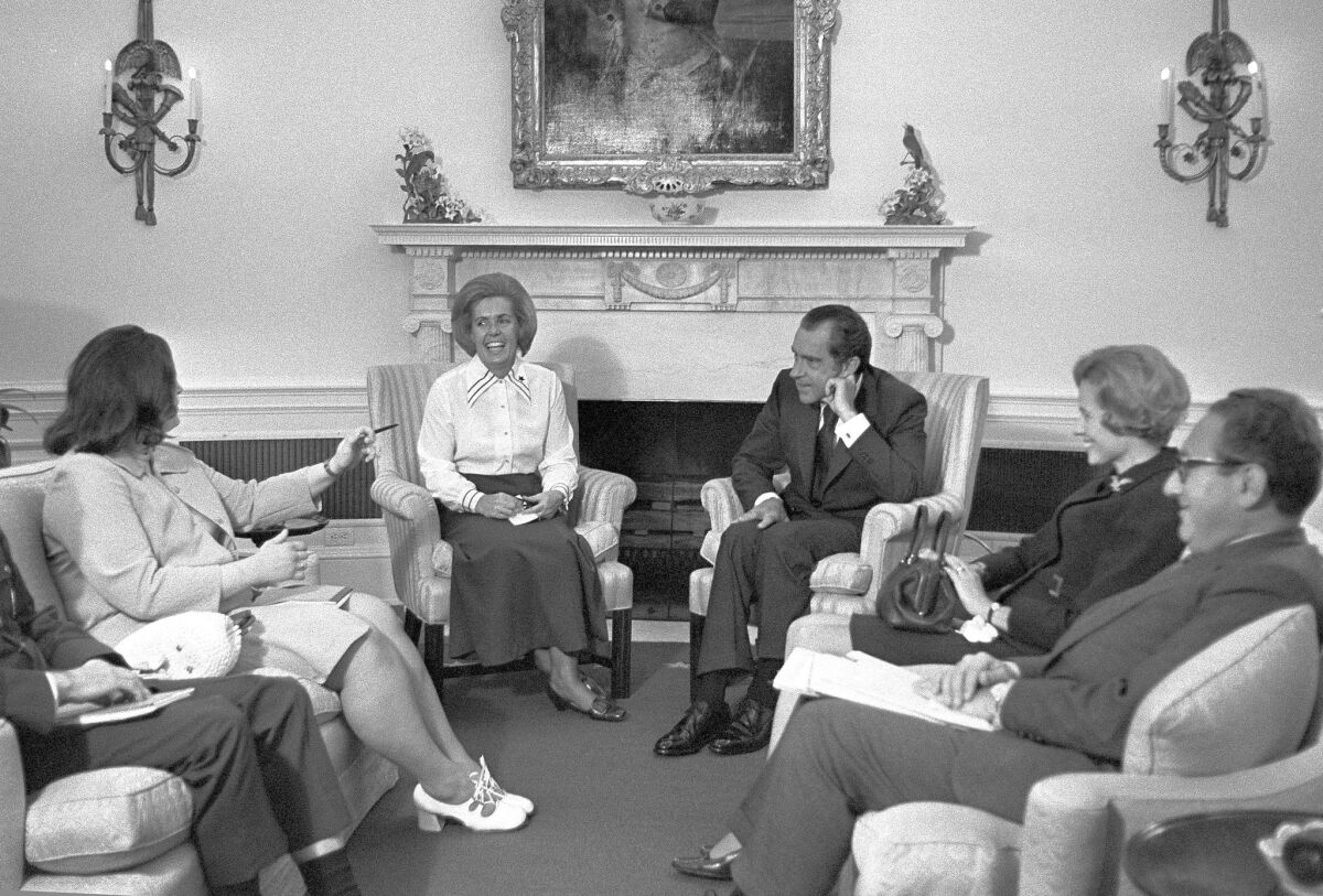 Sybil Stockdale, second from left, and other National League of Families representatives meet with President Nixon in 1972.