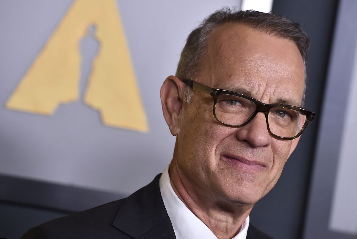 FILE - Tom Hanks arrives at the Governors Awards on Saturday, Nov. 19, 2022, at Fairmont Century Plaza in Los Angeles. Hanks was named the principal speaker at Harvard's commencement on May 25, the Ivy League university announced Tuesday, March 21, 2023. (Photo by Jordan Strauss/Invision/AP, File)