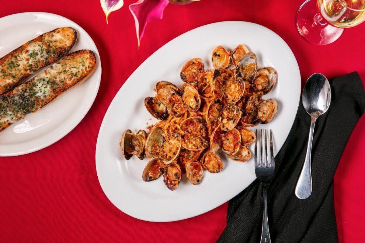 Frank's spaghetti and clams with a side of garlic bread at Dear John's.