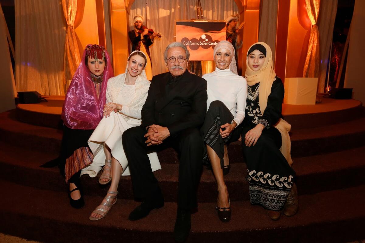 Actor Edward James Olmos, center, poses with dancers (from left) Chanel Pepper, Genevieve Zander, Linda Borini and Alison Fung during the Discovery Ball at the California Science Center on March 7.