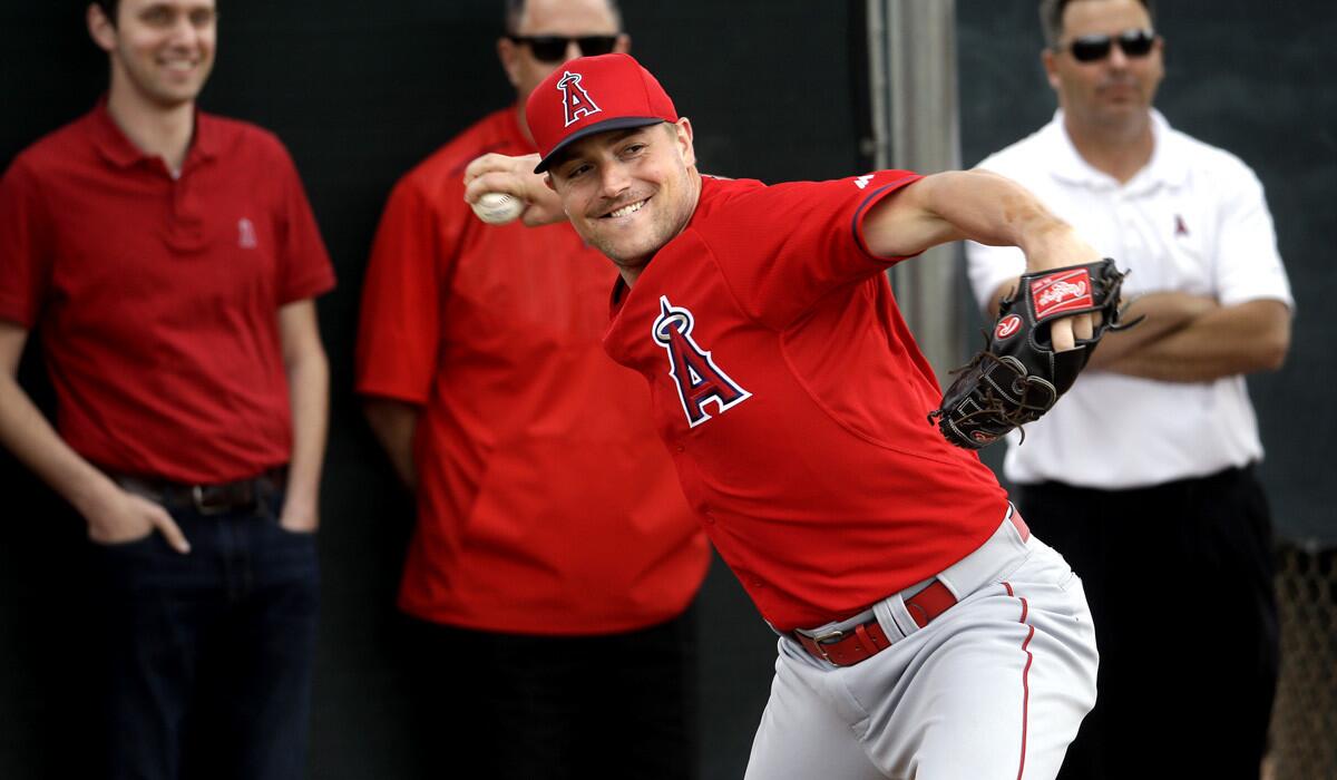 Angels sidearm reliever Joe Smith throws during a spring training workout.