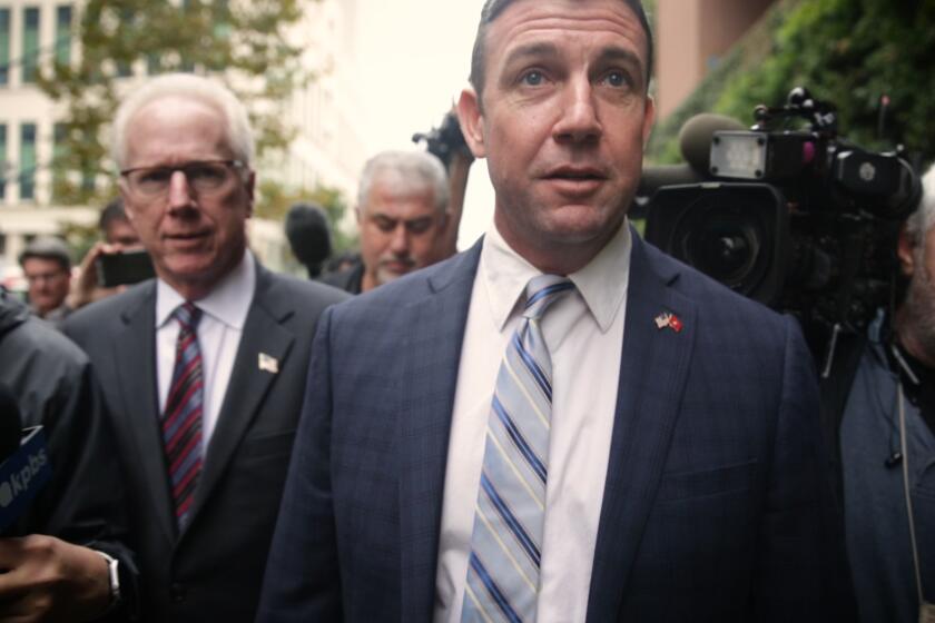 Screen capture from "The 50th: A scandal. A dynasy. An election." documentary showing Duncan Hunter walking into court on Dec. 3, 2019 where he plead guilty to misusing campaign finances.