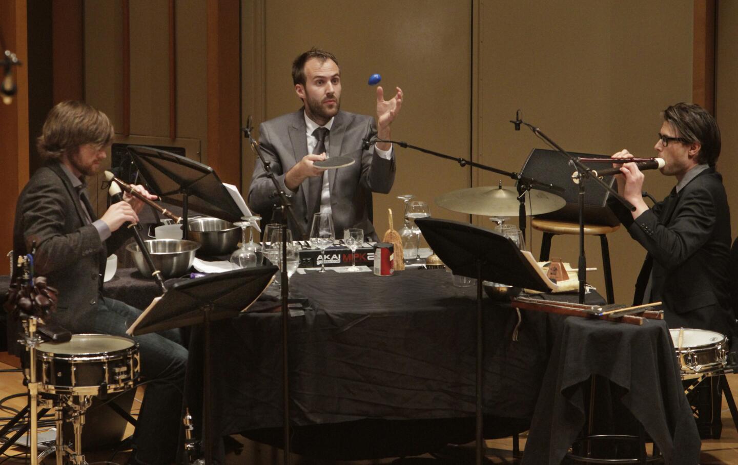 Percussionists Ryan Nestor, left, Eric Derr and Jonathan Hepfer of the Echoi Ensemble performing Thomas Meadowcroft's "The Great Knot" in New Voices II at the Zipper Concert Hall at the Colburn School.