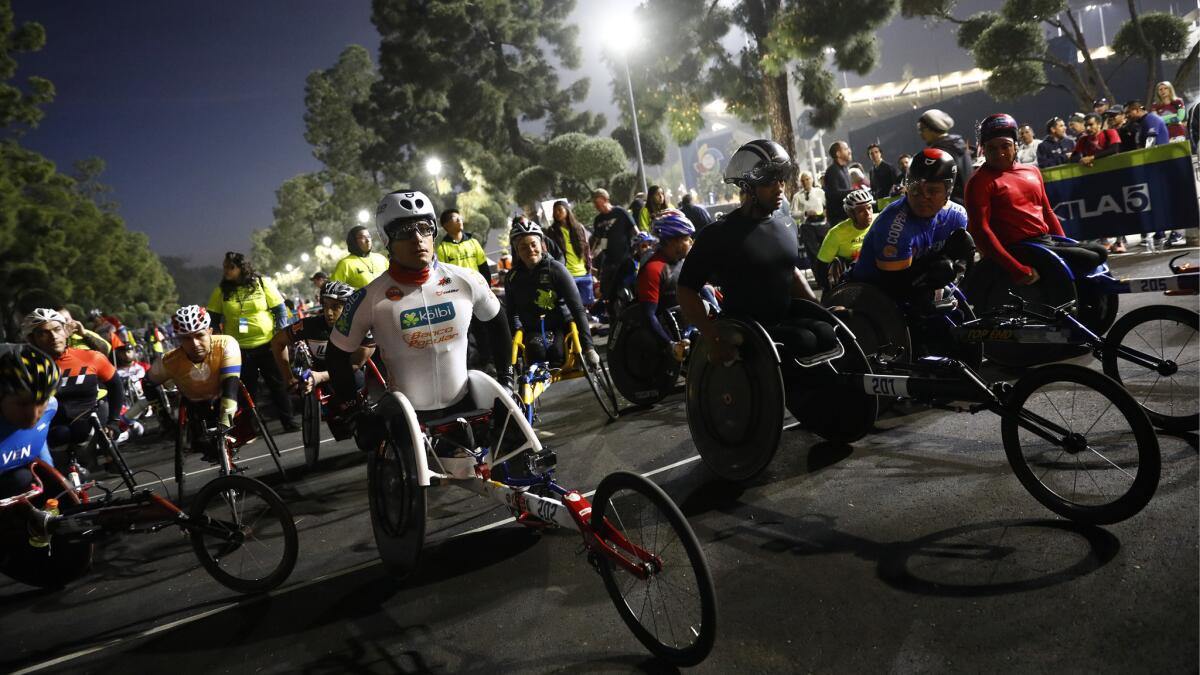 Wheelchair athletes prepare for the start of the wheelchair portion of the LA Marathon.