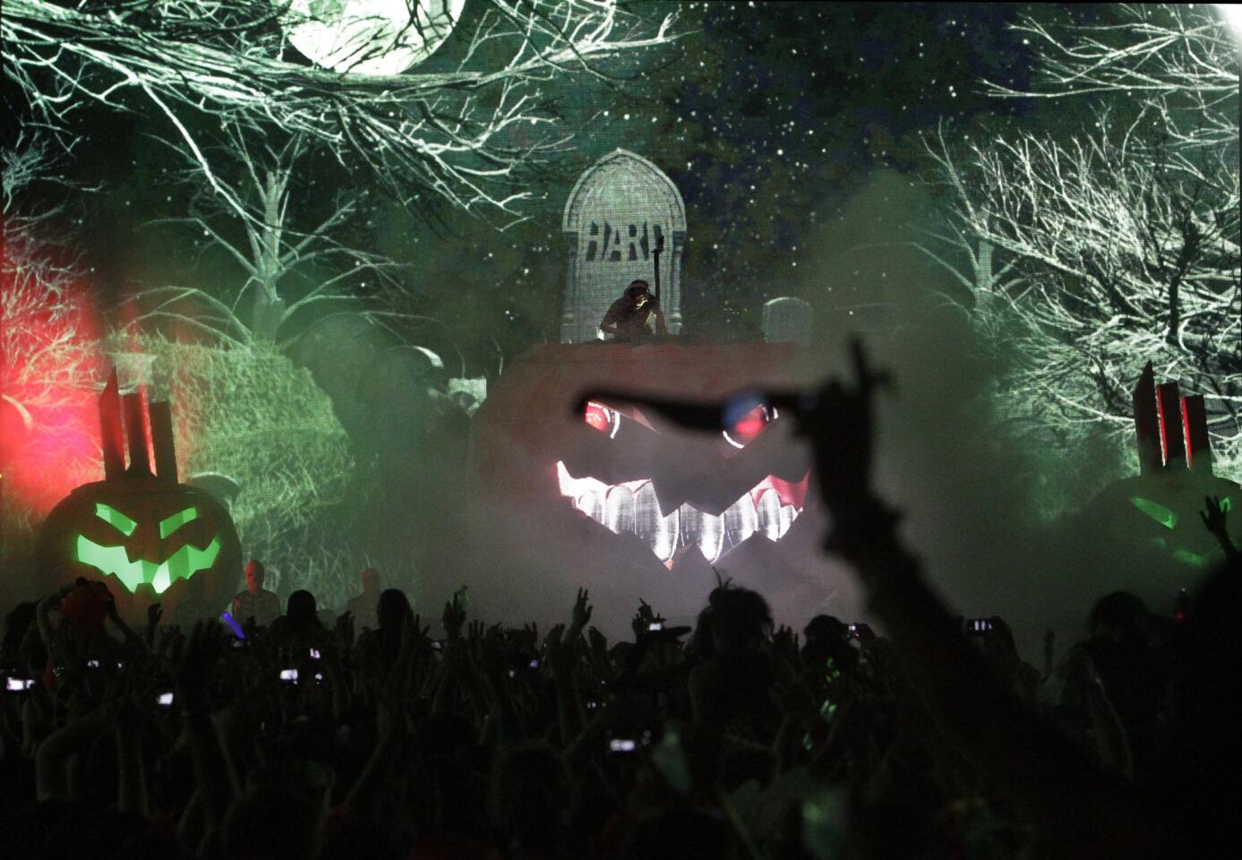 Skrillex, on top of the Halloween pumpkin at the Hard Day of the Dead festival in 2013, has a video out for his new "Ragga Bomb."