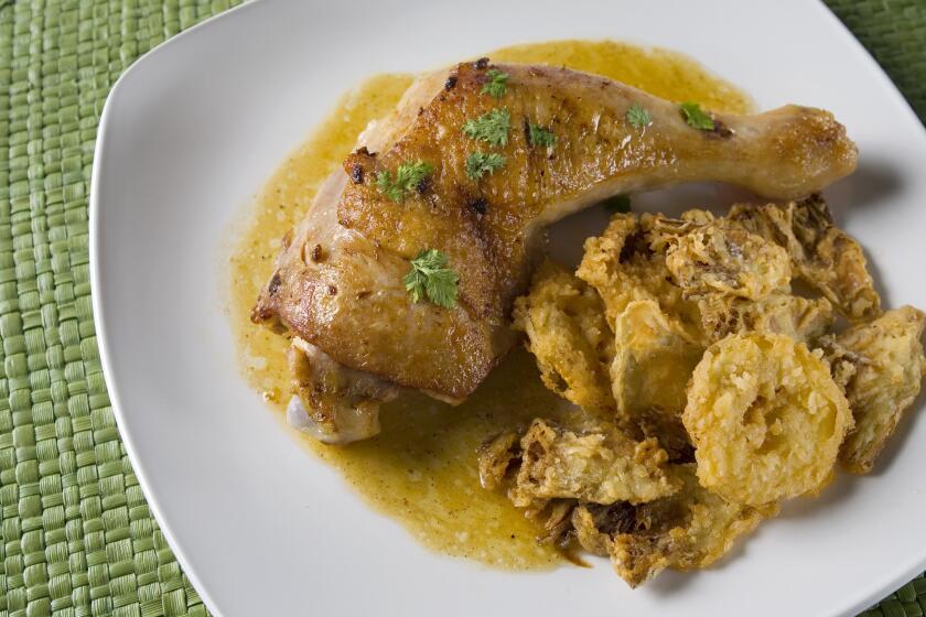 Recipe: Roast chicken with fried artichokes and lemons