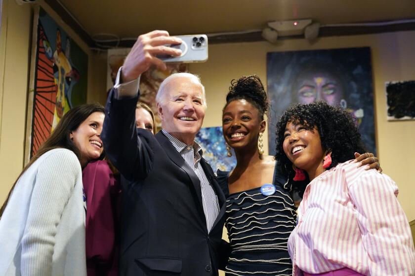 President Joe Biden mingles with diners at Hannibal's Kitchen in Charleston, S.C., Monday, Jan. 8, 2024. Earlier in the day, Biden delivered remarks at Mother Emanuel AME Church in Charleston, where nine worshippers were killed in a mass shooting by a white supremacist in 2015. (AP Photo/Stephanie Scarbrough)