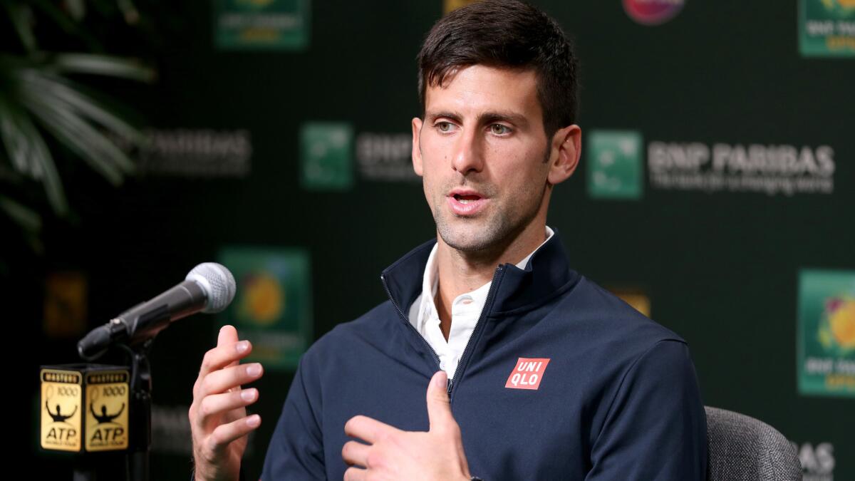 Novak Djokovic talks to reporters during a news conference Thursday at the BNP Paribas Open in Indian Wells.