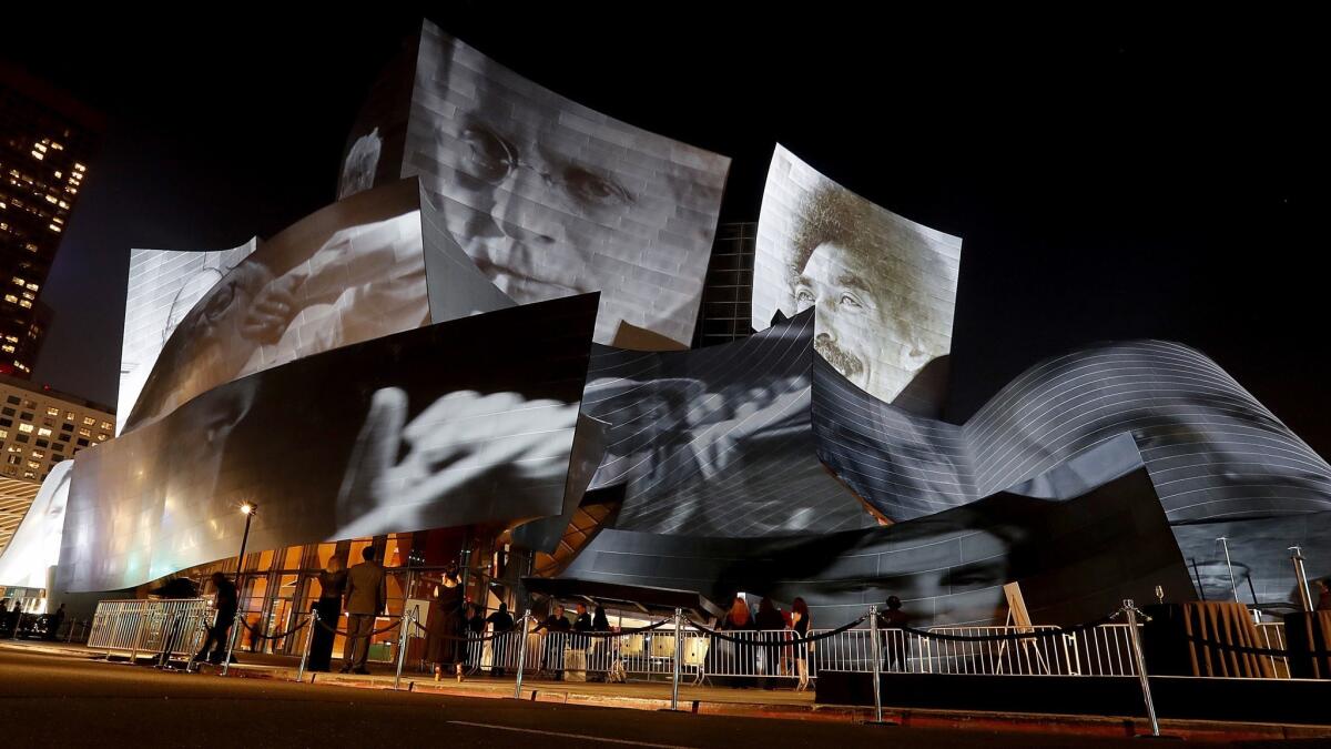 Artwork by Refik Anadol was projected on the exterior of the Walt Disney Concert Hall during the kickoff of the L.A. Phil's centennial season on Thursday.