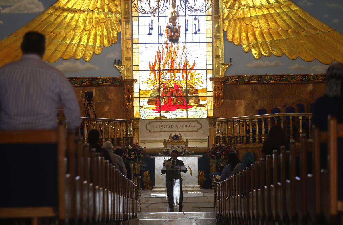 Congregants gather for a prayer service June 5 at La Luz del Mundo Church in East Los Angeles.