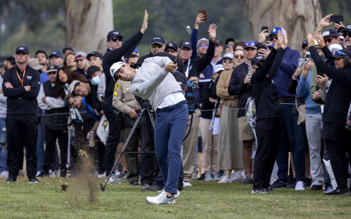 Joaquin Niemann hits out of the rough on the 15th hole during the final round of the Genesis Invitational.