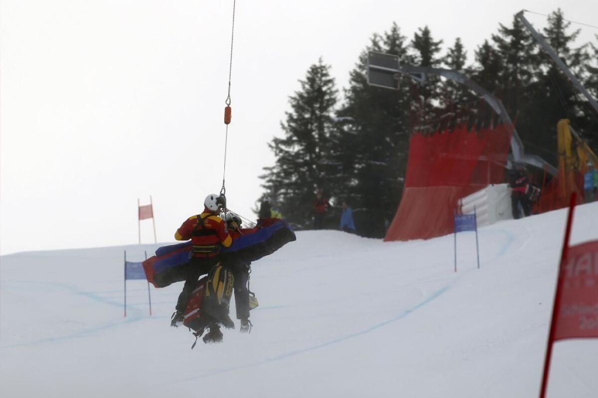 Lindsey Vonn is helicoptered off the course during the Alpine world ski championships.