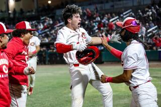 Sam Burgess celebrates his three-run home run in the Division 1 final that lifted Corona to the championship.
