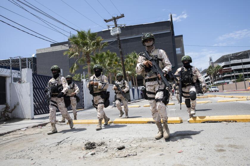 Tijuana , Baja California - August 13: The Mexican National Guard waits for the arrival of military troops.