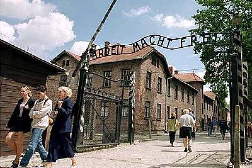 During World War II, more than 1 million died at Auschwitz, the Nazi camp in Poland. The sign at the camp gates translates as "Work makes you free."