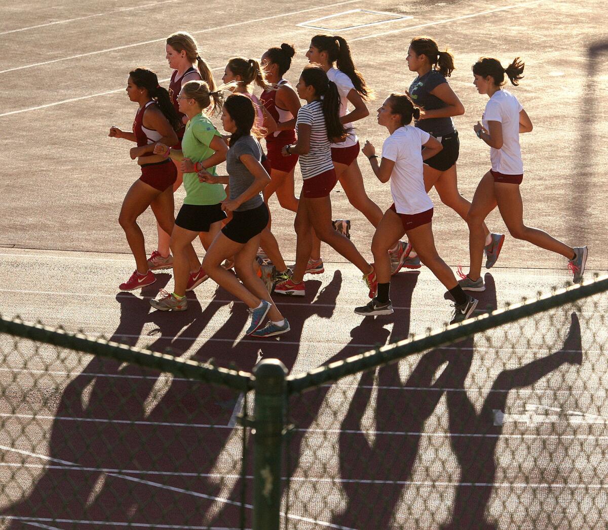 Glendale Community College women's cross country team during practice at GCC during an afternoon practice on Wednesday, Aug. 28, 2013.