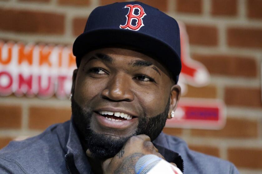 FILE - In this Sept. 30, 2016, file photo, Boston Red Sox's David Ortiz speaks during a news conference before a baseball game against the Toronto Blue Jays at Fenway Park, in Boston. Officials say Ortiz, who was shot in the Dominican Republic on June 9, 2019, at an outdoor cafe, was the victim of incompetent criminals who were trying to kill a man next to him. (AP Photo/Elise Amendola, File)