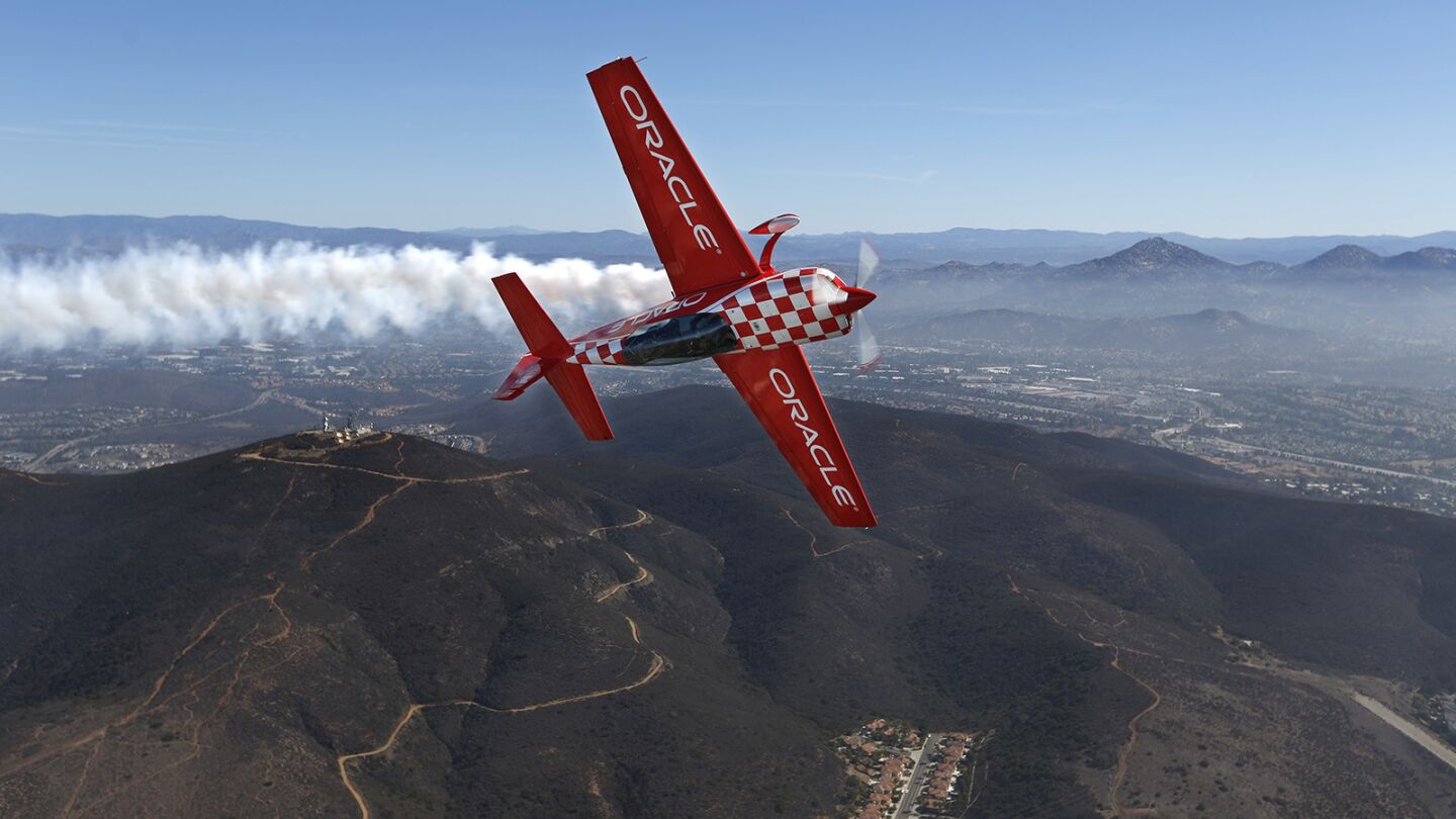 Stunt pilot Sean Tucker took Hannah Hollinger, 16, of El Cajon on a flight in his stunt plane at the MCAS Miramar Air Show on September 27, 2018. The flight was part of the EAA Young Eagle flight program which introduces kids to flight. Tucker is the chairman of the EAA Young Eagles. (Photo by K.C. Alfred/San Diego Union-Tribune)