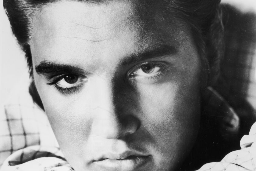 Elvis Presley poses for a portrait circa 1955. August 16, 2002 marks the 25th anniversary of Presley's death. 