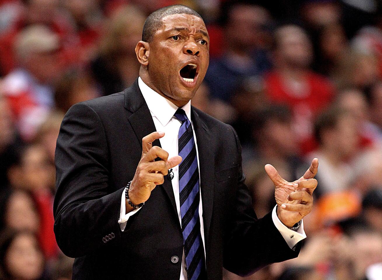Clippers Coach Doc Rivers directs his team against the Warriors last October at Staples Center. In his first year with L.A., Rivers has the Pacific Division champs seemingly poised for a deep run in the NBA playoffs.