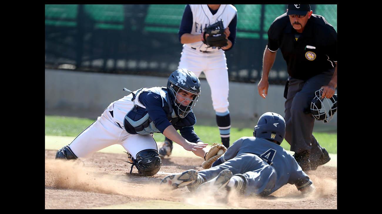 Crescenta Valley High School catcher Brian Ghattas makes the out at home plate in CIF SS Div. II quarterfinal game vs. Yucaipa, at Stengel Field in Glendale on Friday, May 25, 2018. CV lost 5-3.