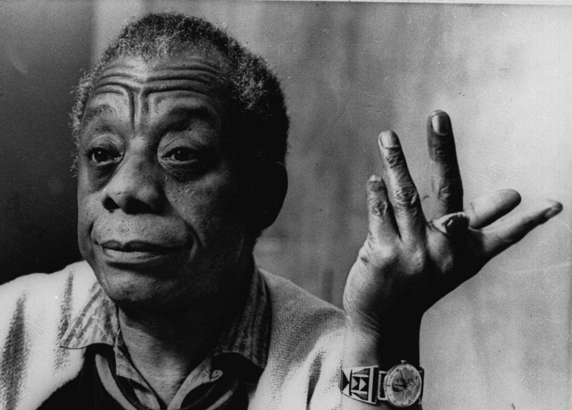 Author James Baldwin gestures in a Feb. 25, 1985 file photo.