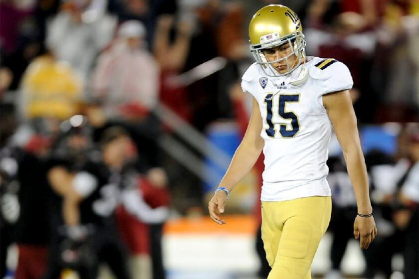 UCLA kicker Ka'imi Fairbairn walks off the field after missing a field goal against Stanford.