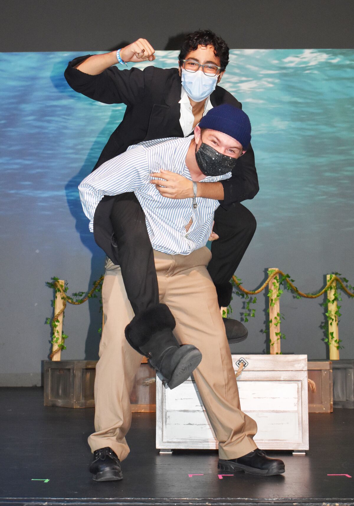 The pirate Black Stache (Andrew Obregon) being carried by Smee (Jack Boyce).