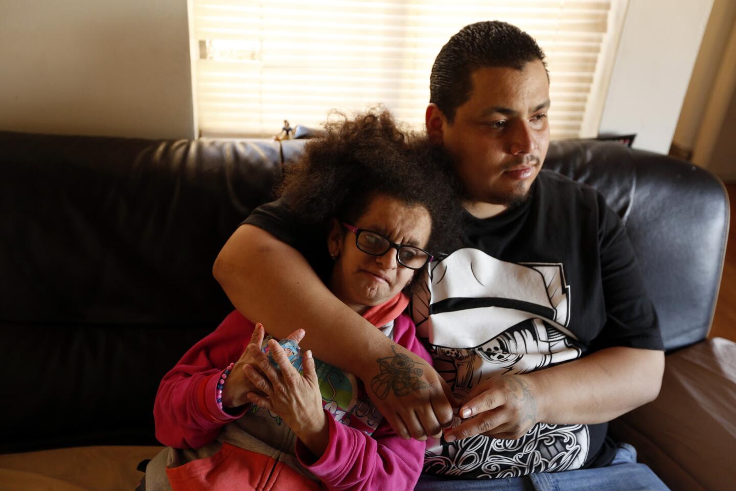 Jesus Alonso Arreola Robles, 22, spends time with his sister Maria Lupita Arreola, 16, who suffers from progeria, in their family's apartment in North Hollywood. Arreola Robles was a beneficiary of Deferred Action for Childhood Arrivals, or DACA.