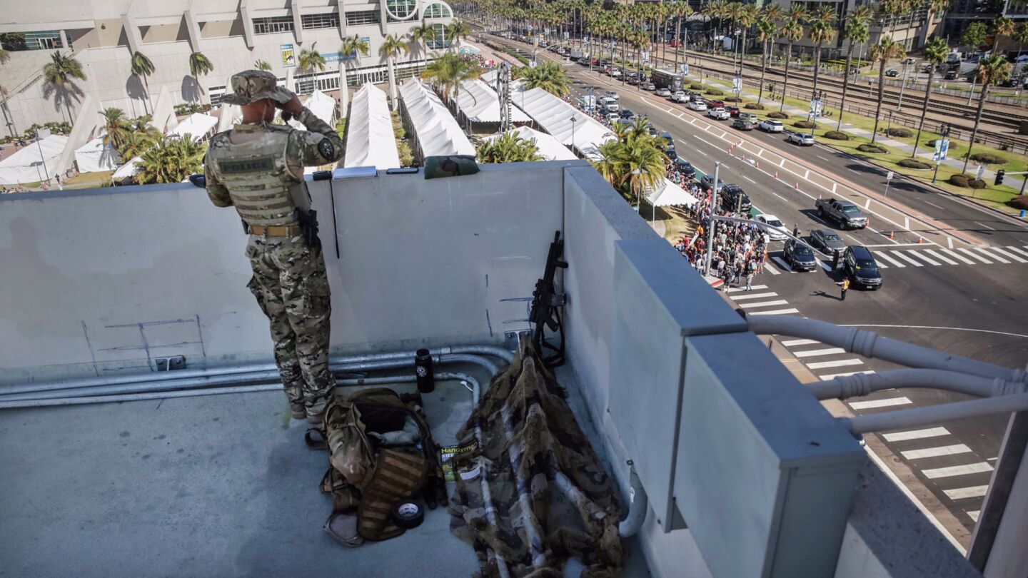Tito Santos, a San Diego Police Department sniper, stands guard over Comic-Con International 2016.