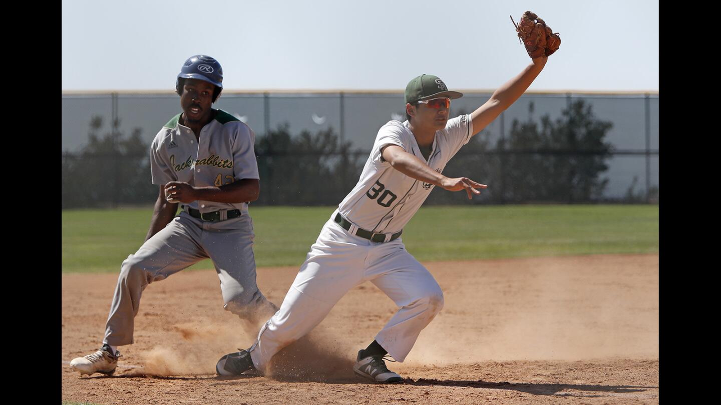 Sage Hill School third baseman William Ho (30) gets the out against Long Beach Poly's Nolan Brown during the first inning in the wild-card round of the CIF Southern Section Division 3 playoffs in Newport Beach on Wednesday, May 16.