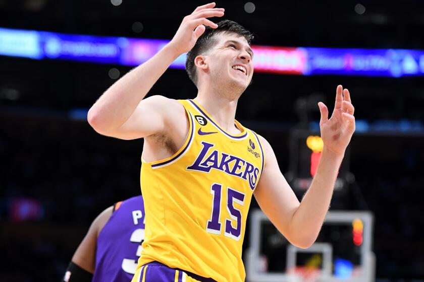Los Angeles, California March 22, 2023-Lakers Austin Reaves reacts after being fouled against the Suns at Crypto.com arena Wednesday. (Wally Skalij/Los Angeles Times)