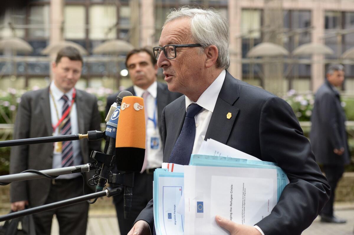 European Commission President Jean-Claude Juncker arrives for a European Union emergency summit on the migration crisis at EU Headquarters in Brussels.
