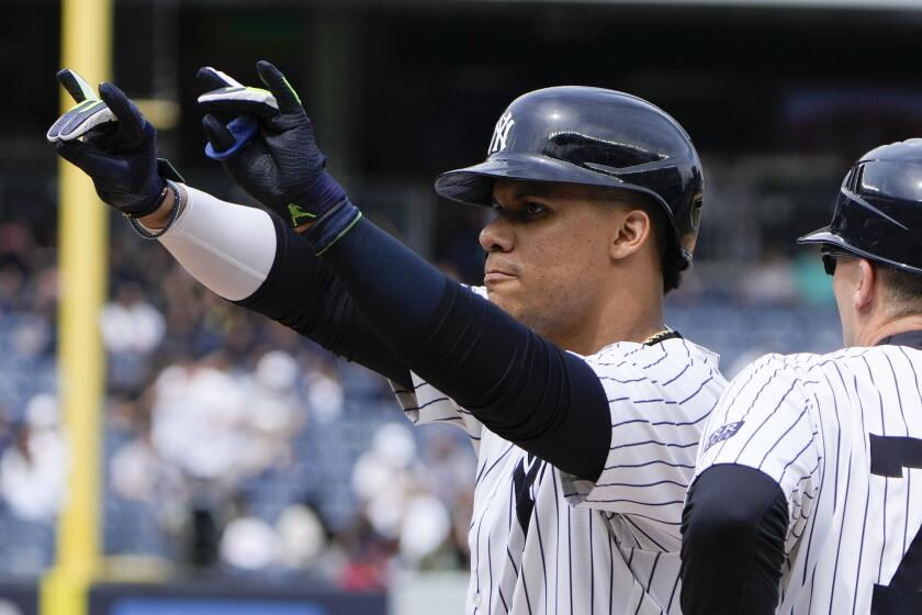 New York Yankees' Juan Soto reacts after hitting an RBI single during the seventh inning of the baseball game against the Seattle Mariners at Yankee Stadium Thursday, May 23, 2024, in New York. (AP Photo/Seth Wenig)